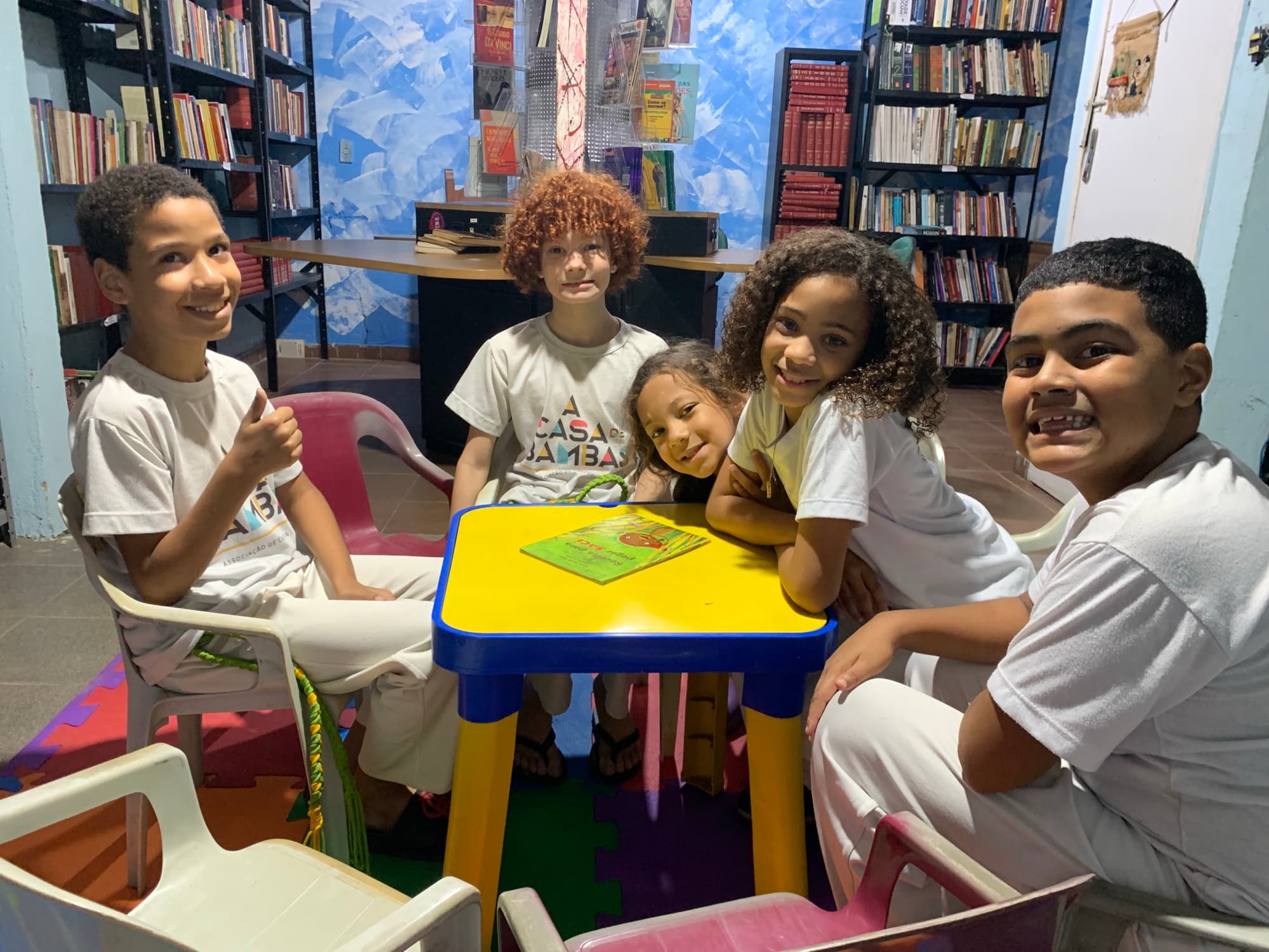 Atividade de Biblioteca Comunitária Christiane Torloni na Casa de Bambas
